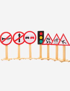 a group of trafic signs on sticks