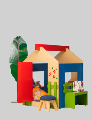 a toy house with a bench and stuffed animals