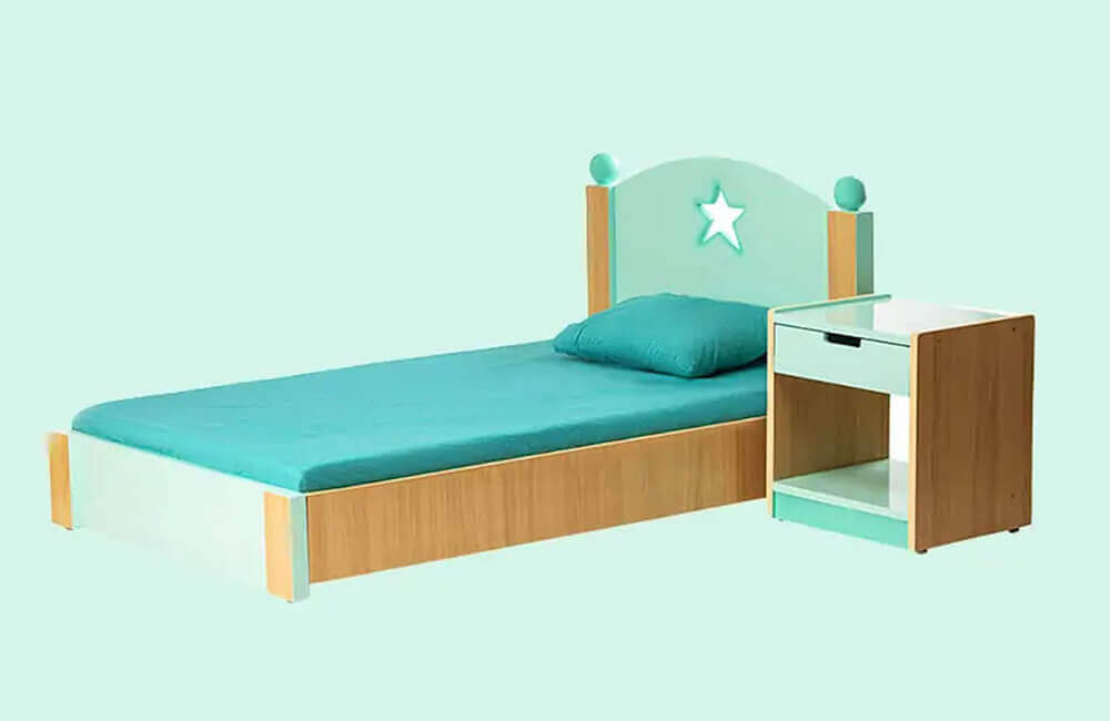 a bed with sight table with blue mattress and pillow with blue backgrounds.
