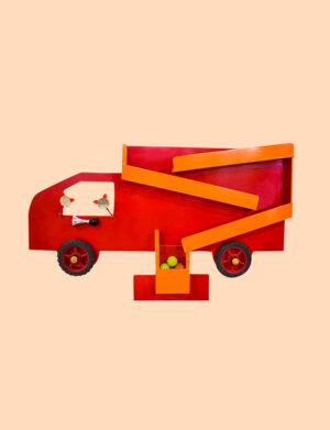 a red toy truck with wheels and a ball in the back